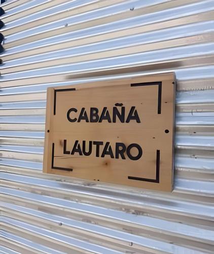a sign that says calandra la latrarro on a wall at Casa en Barrio Privado cerca de la playa in Las Grutas