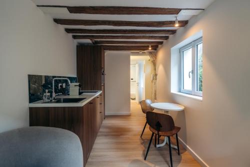 Kuchyň nebo kuchyňský kout v ubytování Le Boudoir