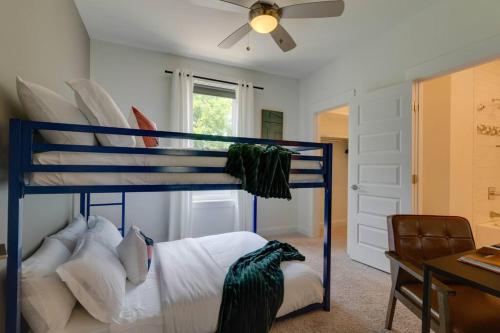 a bedroom with a bunk bed and a desk at Perfectly located-Walk to bars- Close to Broadway in Nashville
