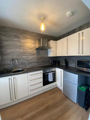 Køkken eller tekøkken på Shore Cottage