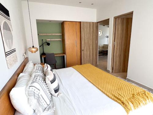 Katil atau katil-katil dalam bilik di Opal Suites Apartments