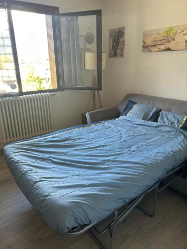 Ένα ή περισσότερα κρεβάτια σε δωμάτιο στο Chamonix Residence les Periades