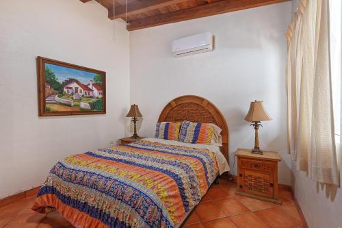 Postel nebo postele na pokoji v ubytování Aventura