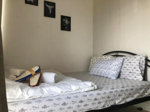 Postel nebo postele na pokoji v ubytování South Residence