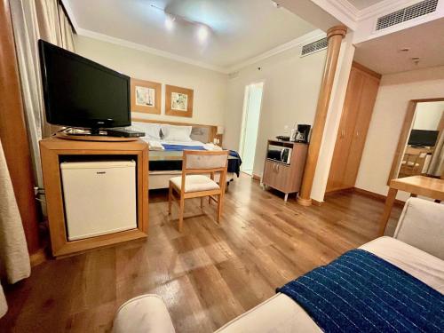Η κουζίνα ή μικρή κουζίνα στο LFlats Hotel Oscar Freire