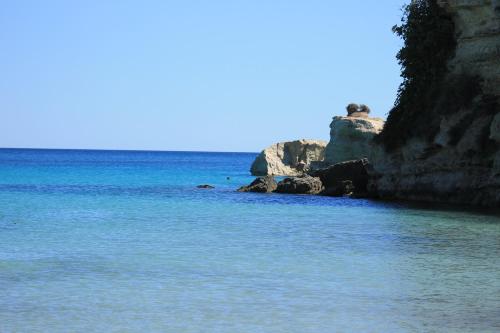 a view of the ocean from a beach at Valle di Mare Country Resort in Fontane Bianche
