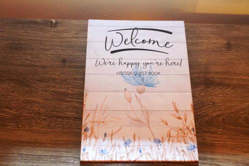 a welcome sign sitting on top of a table at Spacious Pet Friendly Home in Martinsville