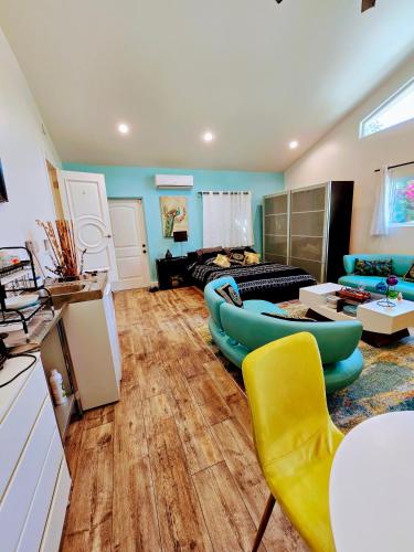 a living room with a couch and a table at Luxury Guesthouse in Los Angeles