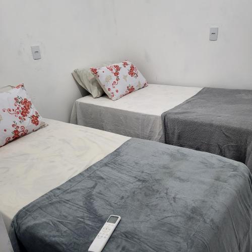Ένα ή περισσότερα κρεβάτια σε δωμάτιο στο Noite hotel sul aeroporto
