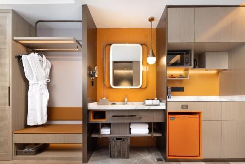 Kuchyň nebo kuchyňský kout v ubytování Home2 Suite by Hilton East Handan Station
