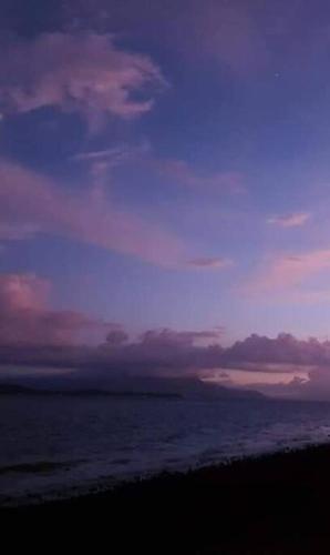 a view of the ocean with a cloudy sky at exclusive VILLA cel in Batangas City