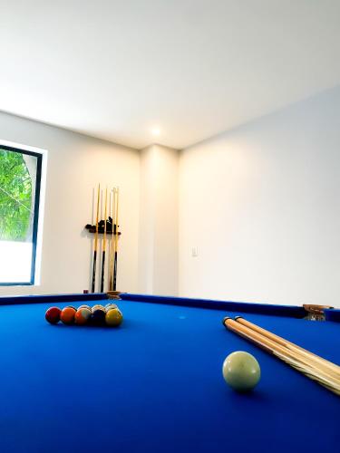 a billiard room with a blue pool table at Keang You Boutique Hotel in Phnom Penh