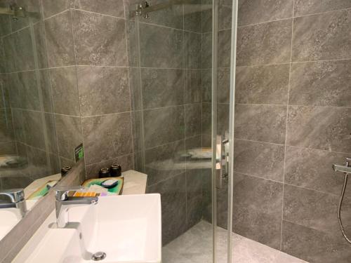 Un baño de CT Green Bay Hot-Spring Hotel