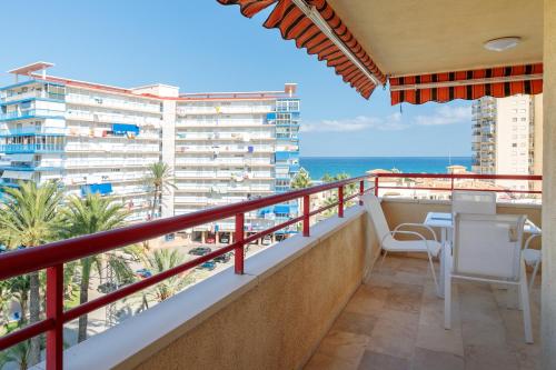 a balcony with a view of the ocean at Torre Mar Muchavista in El Campello
