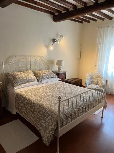 Postel nebo postele na pokoji v ubytování B&B Arivellini