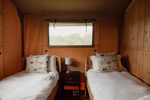 Katil atau katil-katil dalam bilik di Seven Hills Hideaway - Three Bedroom