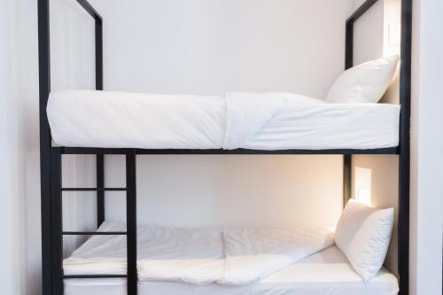 Cama o camas de una habitación en 91 Loop Boutique Hostel