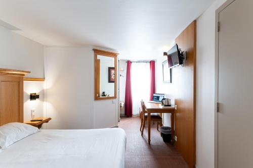 Cama o camas de una habitación en KYRIAD CREIL - Chantilly Nord