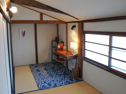 Posezení v ubytování Tatsuno Castle Town Machiya Villa Kurasu