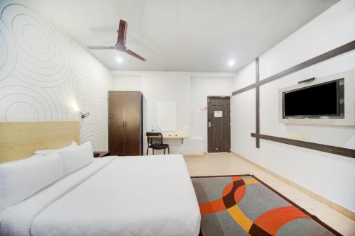 Giường trong phòng chung tại Hotel O Everest Hotel