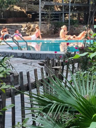 a group of people in a swimming pool at Hoa lu Eco Homestay in Ninh Binh