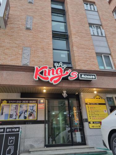 a krispy kreme sign on the side of a building at 프라이빗공간 in Gwangju
