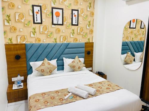 Cama o camas de una habitación en Hotel Avenue Sky
