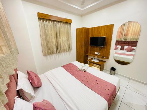 Cama o camas de una habitación en Hotel Avenue Sky