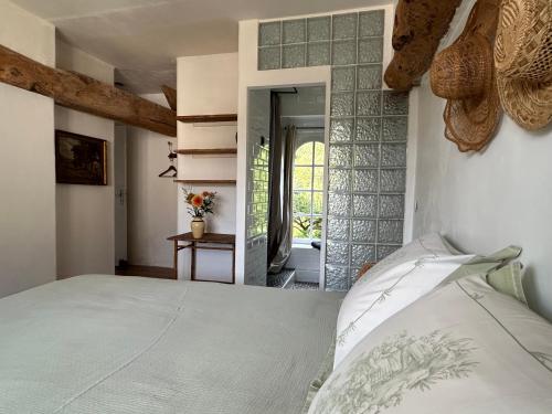 Postel nebo postele na pokoji v ubytování Chambres d'Hôtes Manoir Du Chêne