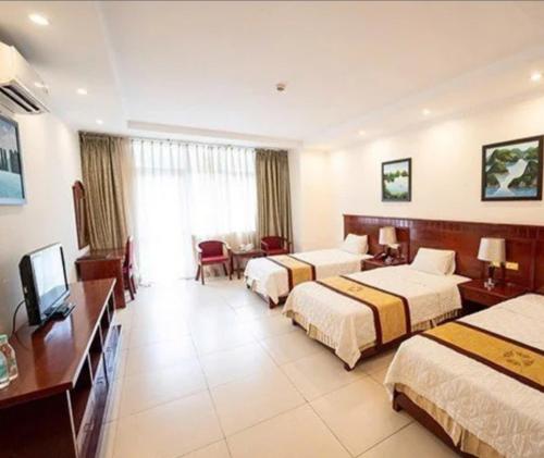 TV a/nebo společenská místnost v ubytování Hotel Đại An An