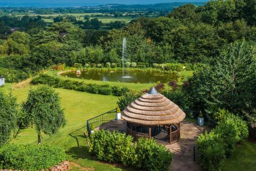 an aerial view of a gazebo in a garden at DoubleTree by Hilton Bristol South - Cadbury House in Yatton