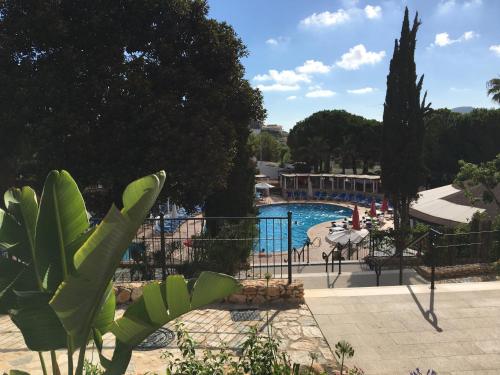 a view of a swimming pool in a resort at Ona Lomas Village - La Manga Club in La Manga del Mar Menor