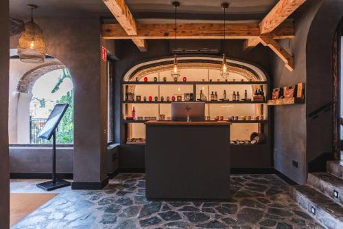 a bar in a room with a large window at Ona Lomas Village - La Manga Club in La Manga del Mar Menor