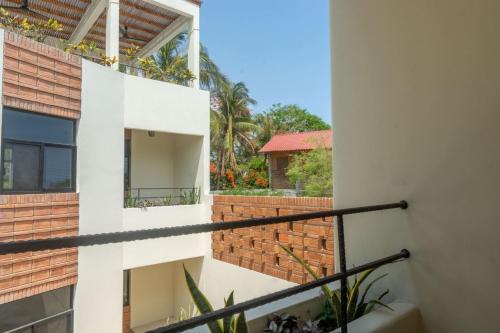 a view from the balcony of a house at Aymara Punta Zicatela in Brisas de Zicatela