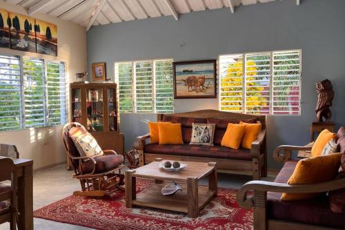 a living room with a couch and a table at Apto close to more than 19 tourist attractions in La Entrada