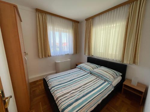 Katil atau katil-katil dalam bilik di Apartman Theresa