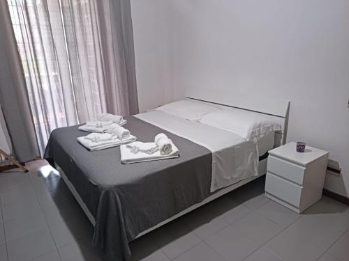 Ένα ή περισσότερα κρεβάτια σε δωμάτιο στο H24 apartment