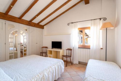 Postel nebo postele na pokoji v ubytování Hotel Sonia