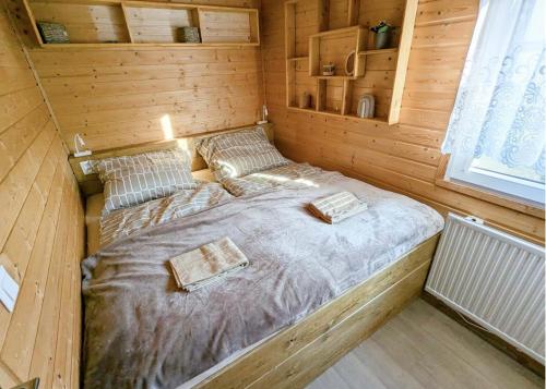 Giường trong phòng chung tại Sedmikvítek