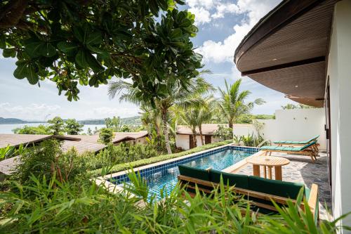 a view of the swimming pool of a villa at Barcelo Coconut Island, Phuket in Phuket Town