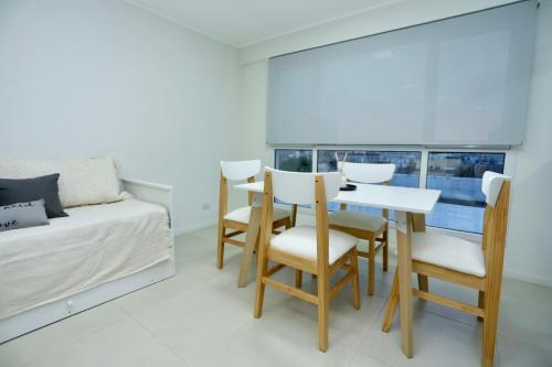 Katil atau katil-katil dalam bilik di Departamento en Trelew - céntrico y moderno