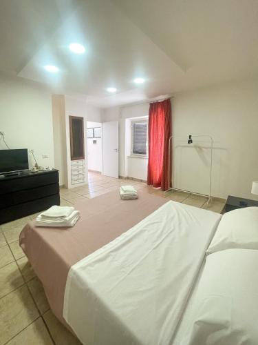 Postel nebo postele na pokoji v ubytování Giallo Limone B&B