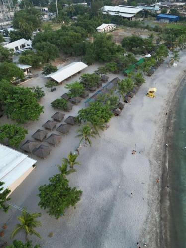 an aerial view of a beach with palm trees at Samba Bluewater Resort in Olongapo