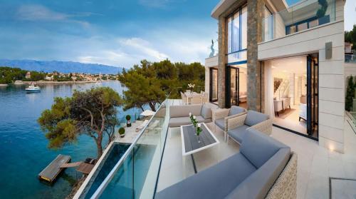 Luxury Seafront Villa Prestige Brac with private pool, sauna and gym and private sea deck at the beach on Brac island