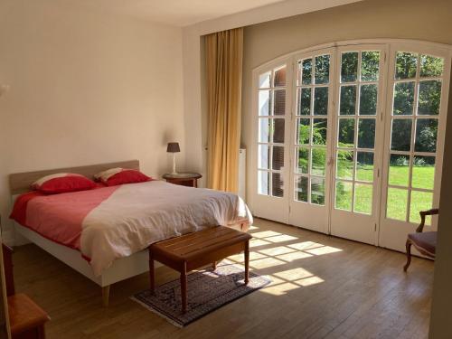 Ένα ή περισσότερα κρεβάτια σε δωμάτιο στο Chambre d'hôtes Gîte du Grand Sancerrois