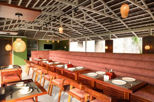Ein Sitzbereich in der Unterkunft Tomorrowland Farms and Suites