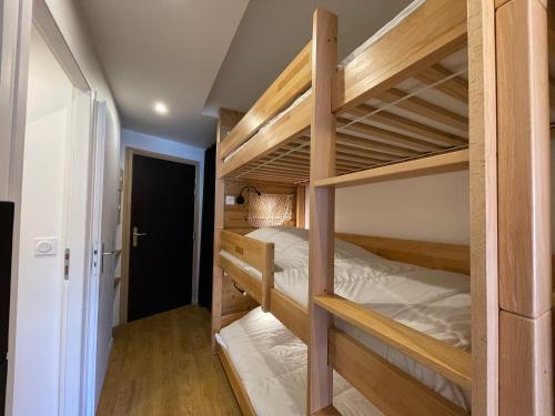 a bunk bed room with two bunk beds at Homency - Résidence La Meije 5 in L'Alpe-d'Huez