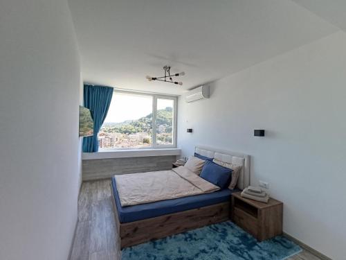 Postel nebo postele na pokoji v ubytování Balkan Tower Deluxe