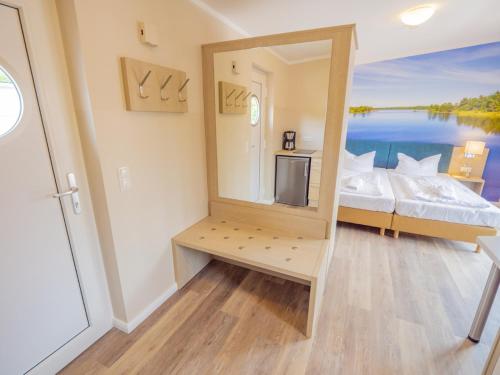 Η κουζίνα ή μικρή κουζίνα στο Apartment am See - 11