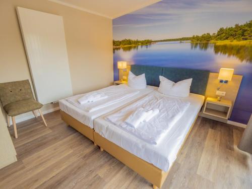 Ένα ή περισσότερα κρεβάτια σε δωμάτιο στο Apartment am See - 11